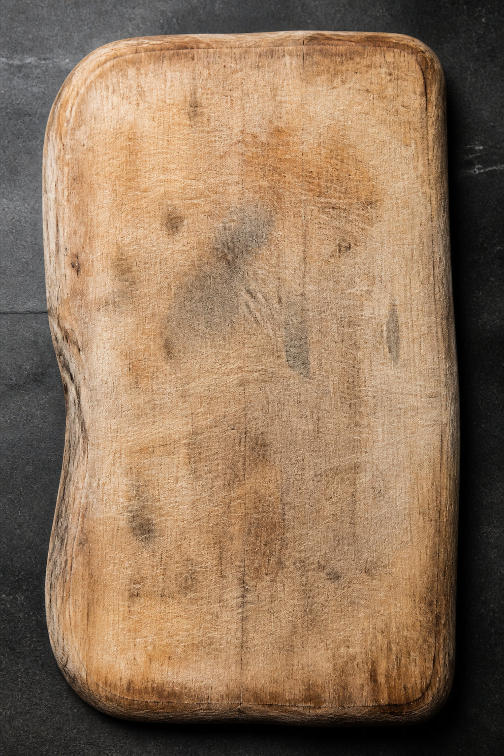 Warped wooden cutting board